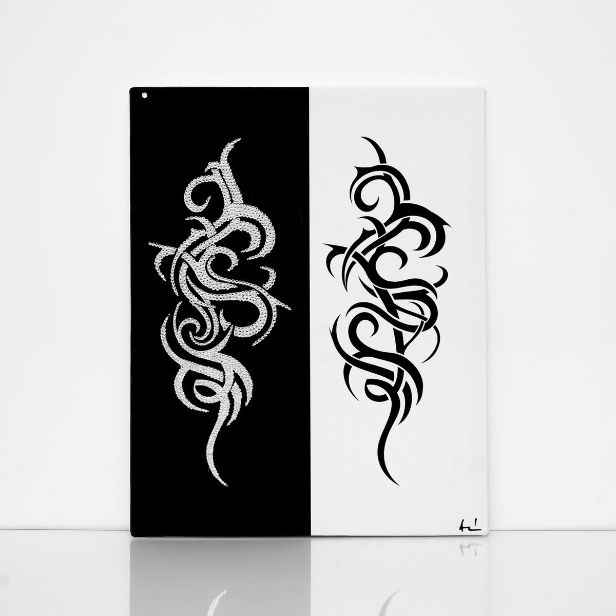 Black and white Tattoo canvas print with clear crystals on shiny floor
