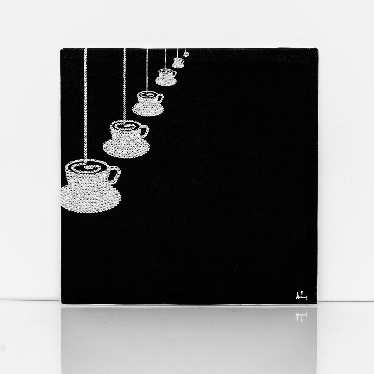 Black and white Coffee cups canvas print with clear crystals on shiny floor