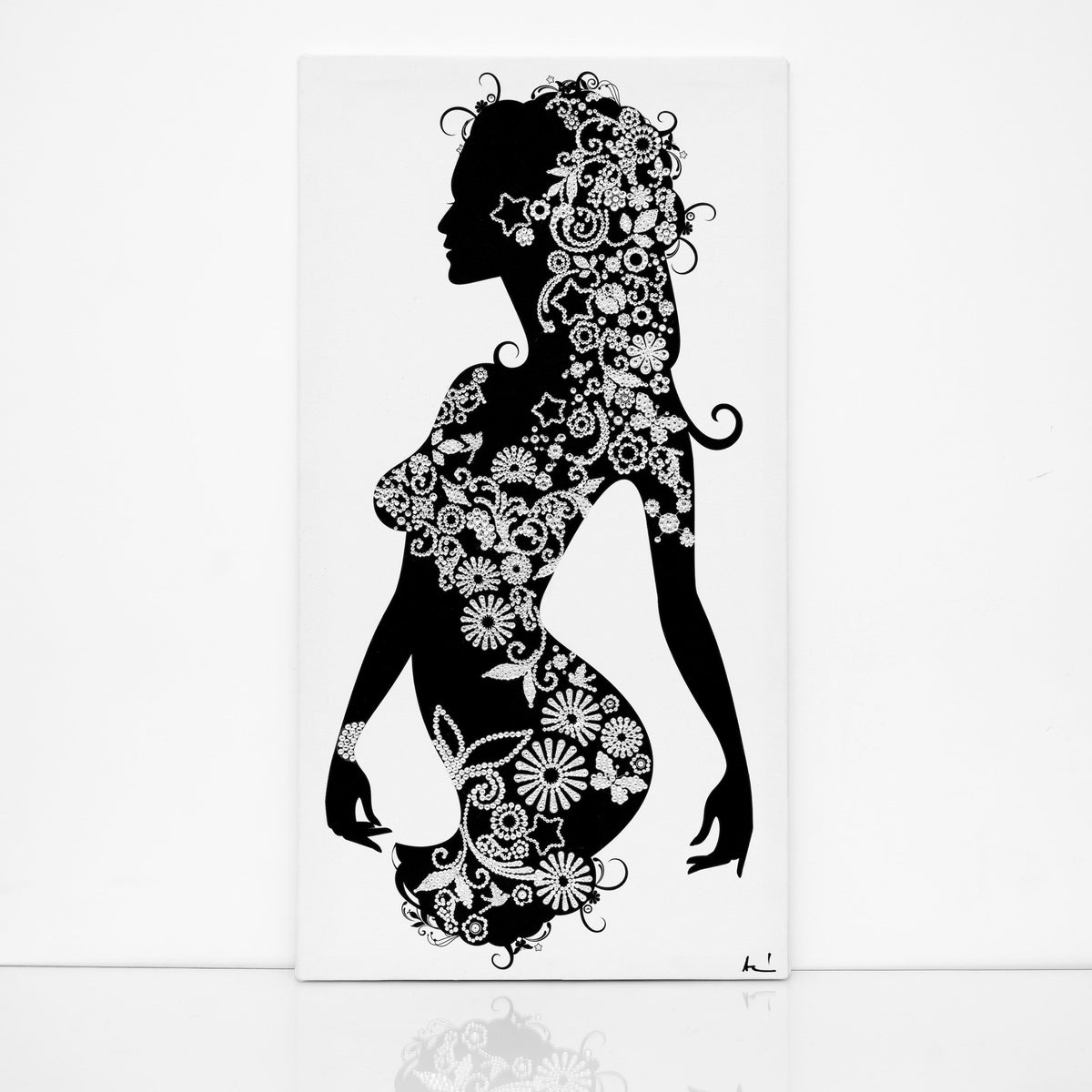Black and white Floral woman canvas print with clear crystals on shiny floor