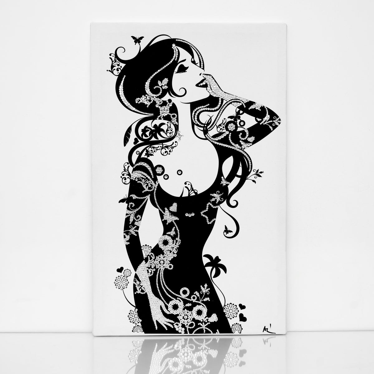 Black and white Lady canvas print with clear crystals on shiny floor