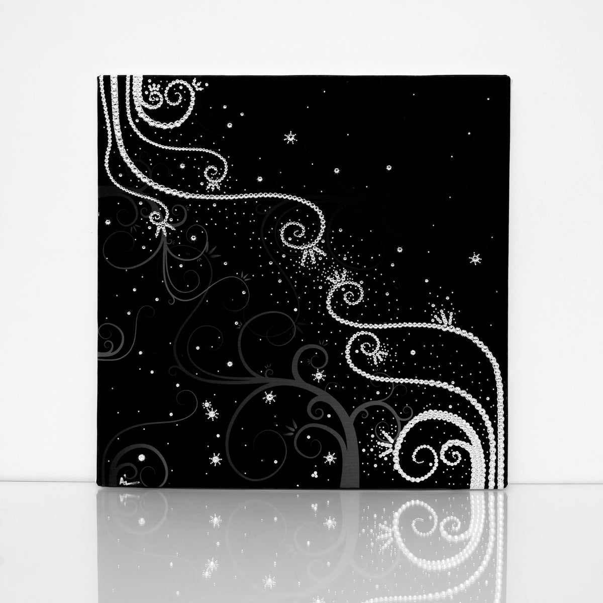 Black and white Tendrils canvas print with clear crystals on shiny floor