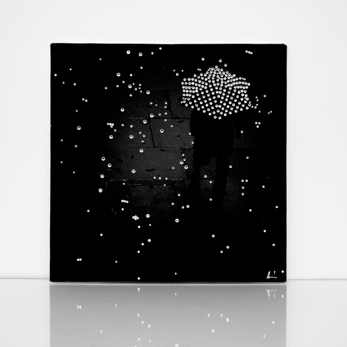 Black and white Walking in the rain canvas print with clear crystals on shiny floor
