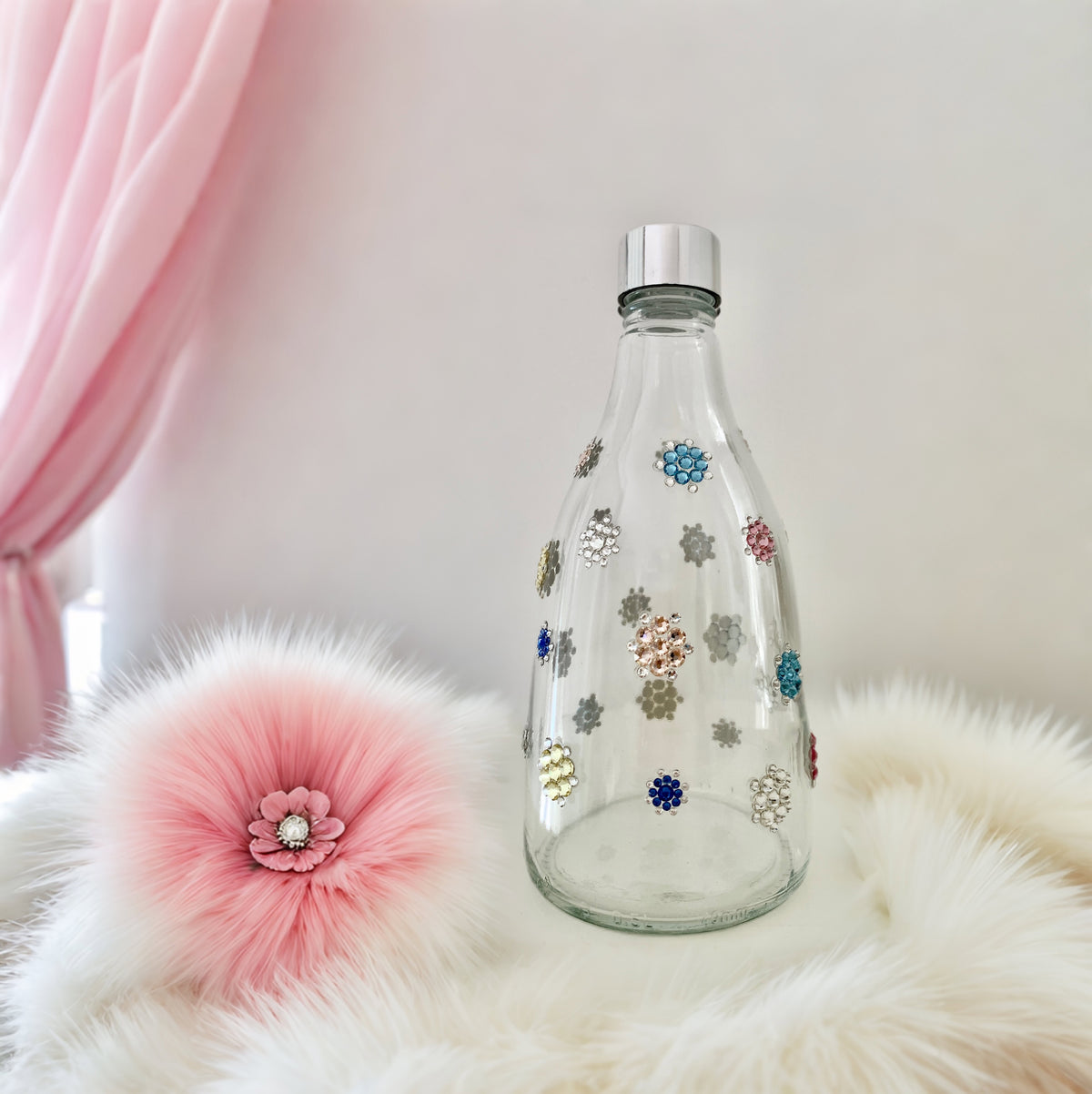 Small flowers glass water bottle with colorful crystals and silver cap in delicate setting
